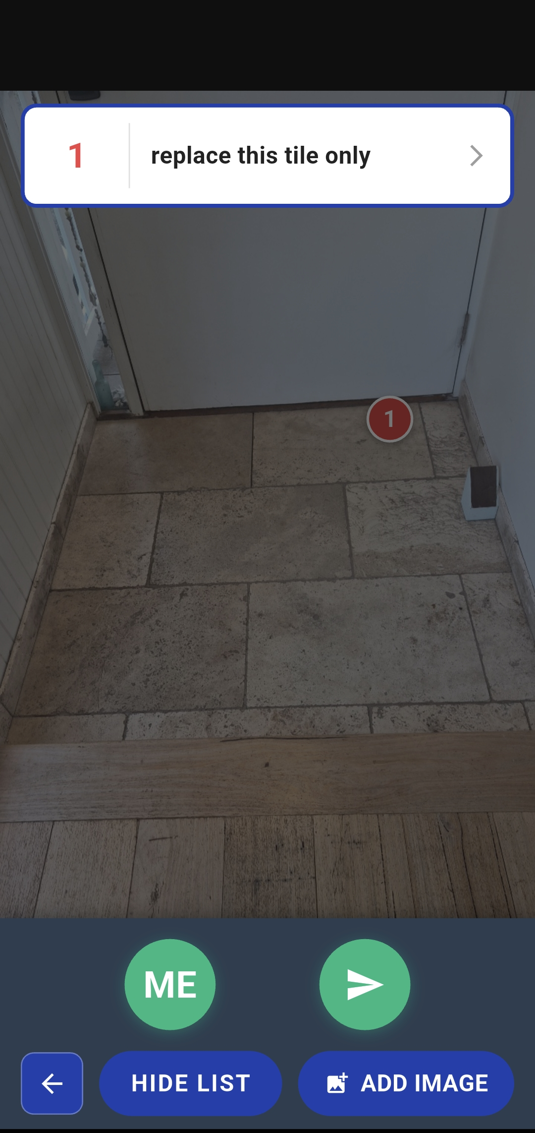 Tiled surface with marker on specific tile